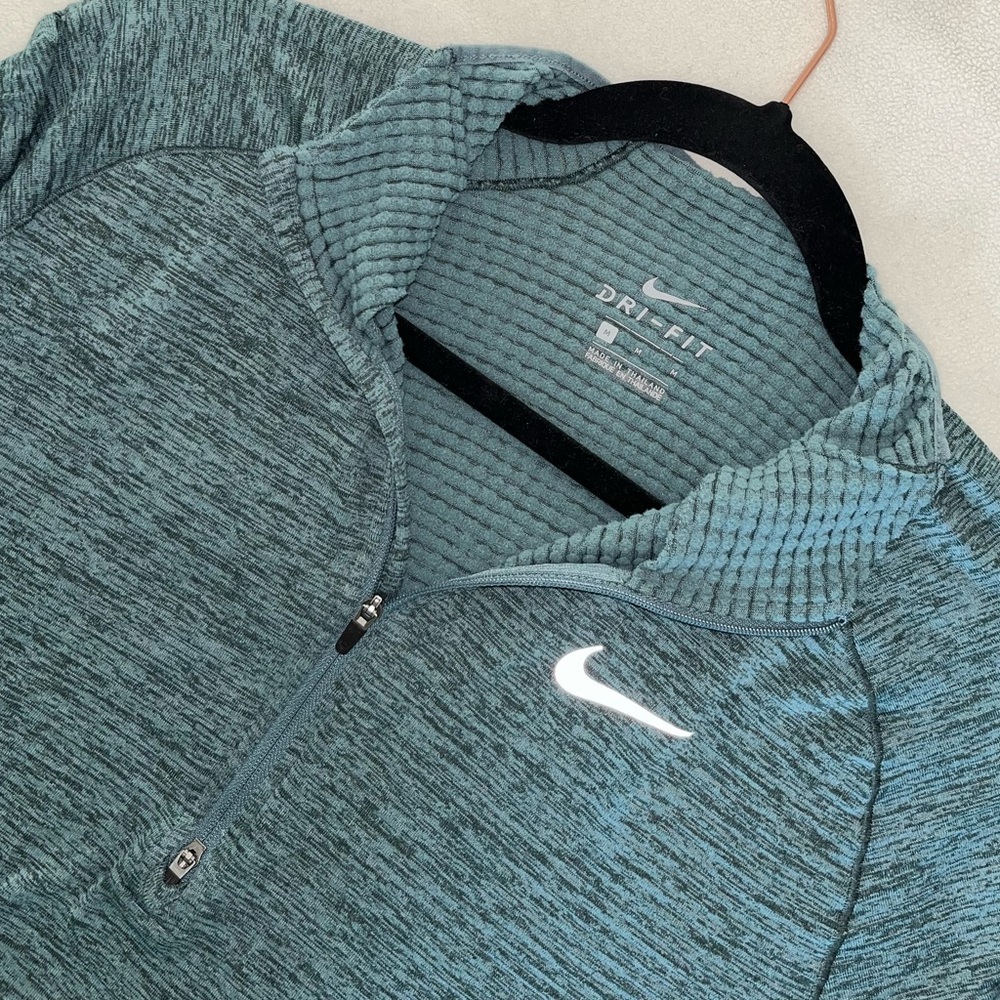 selling Nike Dri-fit long sleeve shirt. In good condition, size medium.